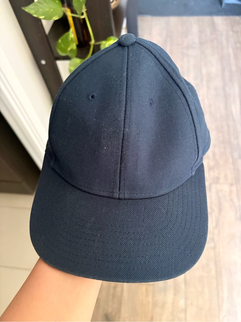 Mitchell & Ness Navy Snapback Cap with Red Logo Tag